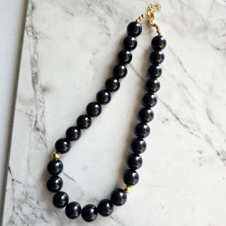 Maxi collar con piedra ónix...